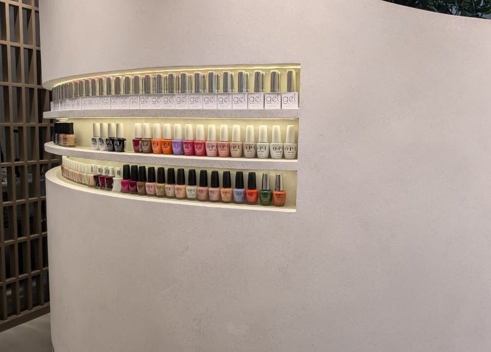 Elegant nail polish display at Mystt by Sophia Ladies Salon L.L.C in Dubai, AE showcasing a variety of colors.