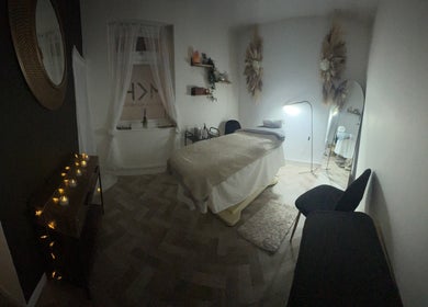Tranquil treatment room at Beauty by Lauren at Hair Aesthetic Club, Dudley, England, GB, featuring cozy decor.