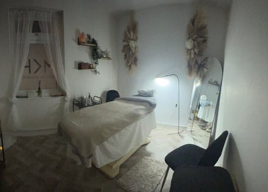 Cozy wellness room at The Beauty Room at Hair Aesthetic Club, Dudley, England, GB, featuring soothing decor.