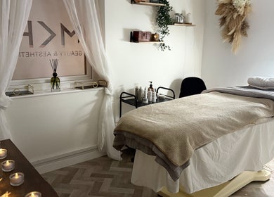 Tranquil treatment room at The Beauty Room at Hair Aesthetic Club, Dudley, England with soft lighting and cozy decor.