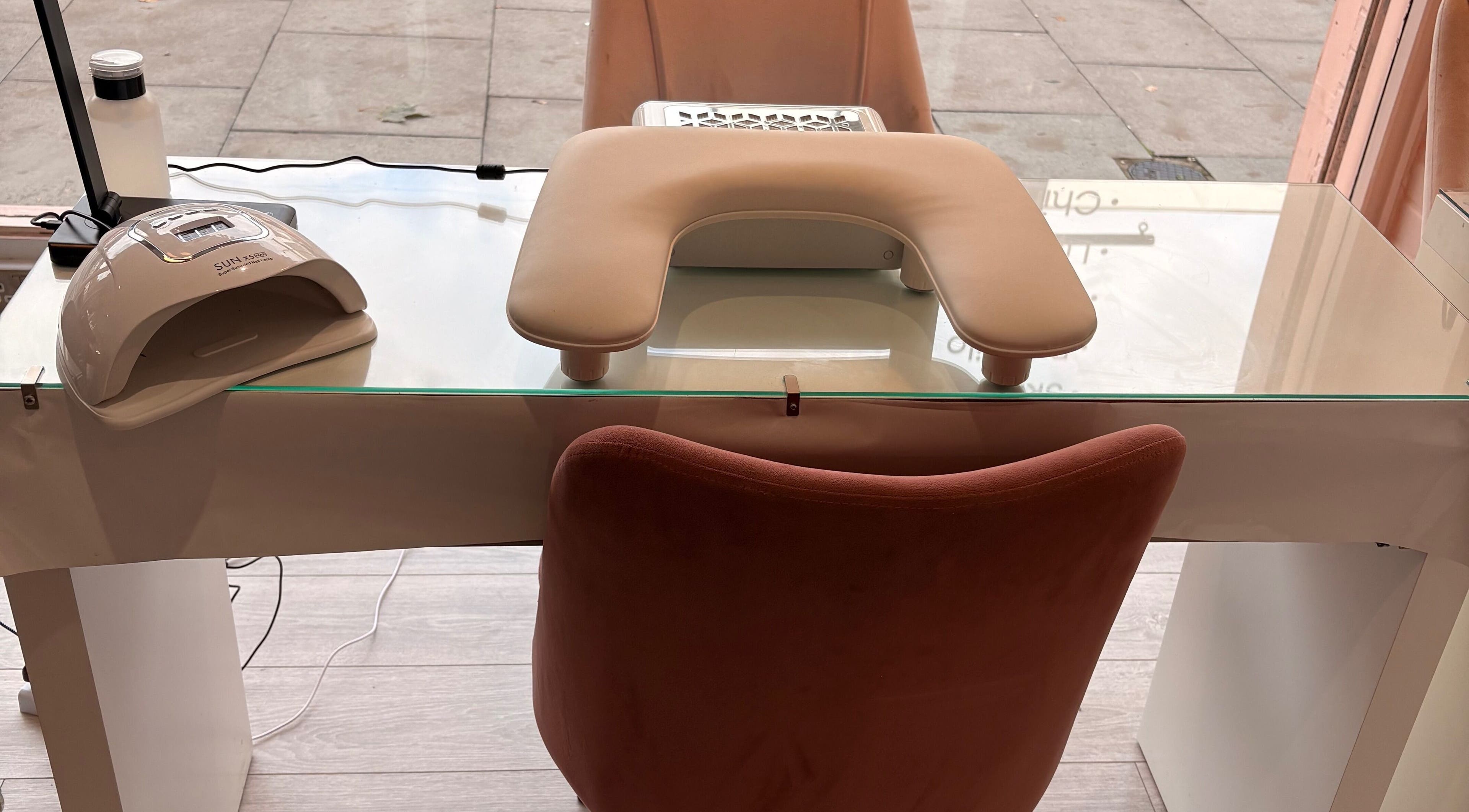 Manicure station at Nova - Hair and Nails, Coulsdon, England, GB showcasing modern nail care setup.