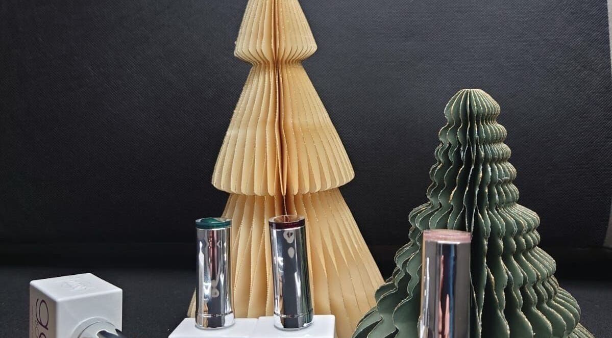 Nova - Nails in Coulsdon, England, displays festive trees with chic nail polish.