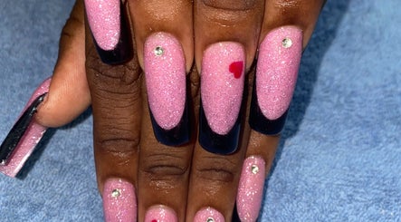 Sparkling pink nails with black tips and gems at shine.haus.studio, Oxnards, Saint James, BB.