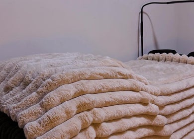 Luxurious plush blankets at K-DollzxLashes, Winnipeg, Manitoba, CA. Perfect setting for relaxation.