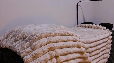 Luxurious plush blankets at K-DollzxLashes, Winnipeg, Manitoba, CA. Perfect setting for relaxation.