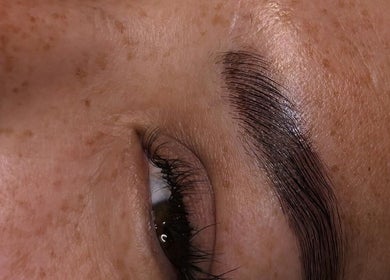 Close-up of expertly shaped eyebrow at K-DollzxLashes in Winnipeg, Manitoba, CA.