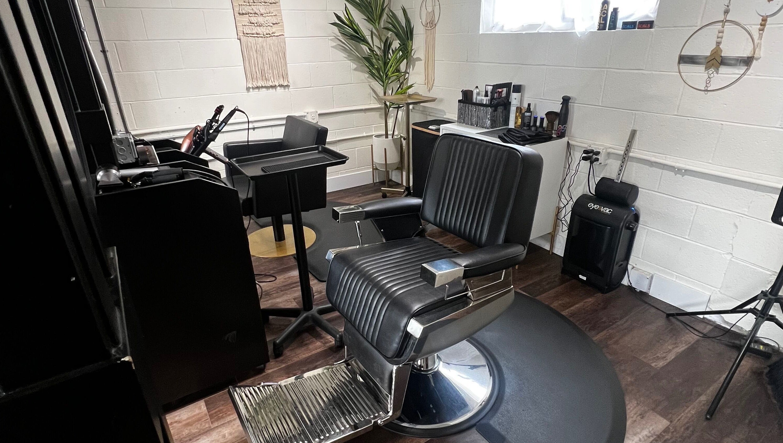 Modern salon chair at Tristen Graves, Ridgefield, Washington, US, offering a chic beauty experience.