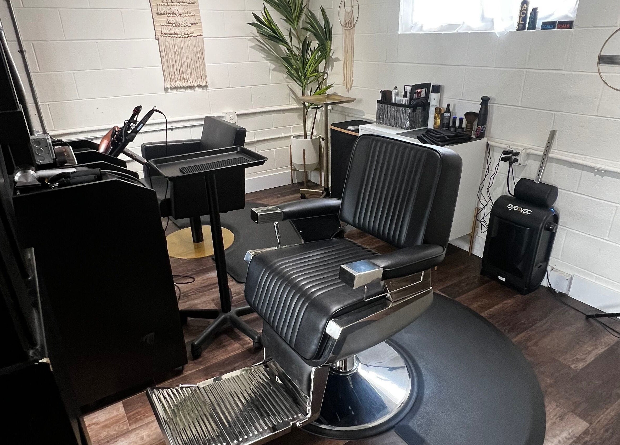 Modern salon chair at Tristen Graves, Ridgefield, Washington, US, offering a chic beauty experience.