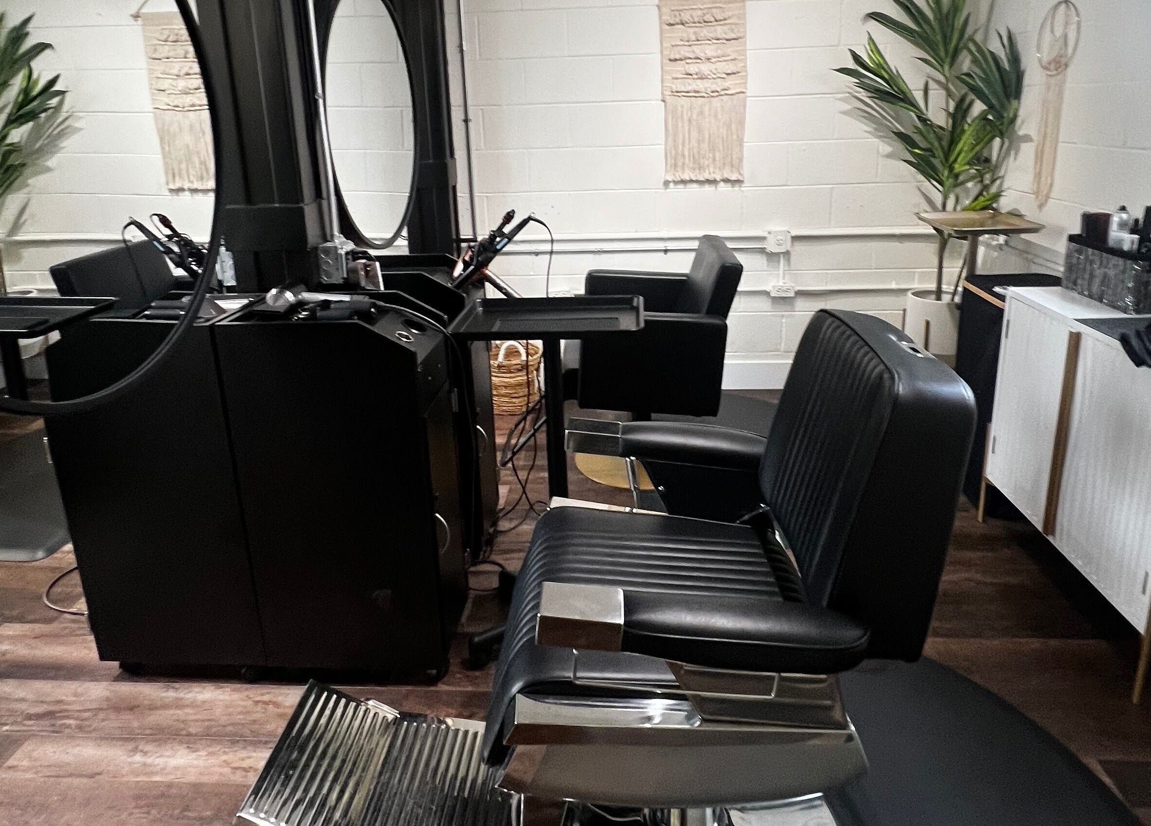 Modern salon chairs and mirrors at Tristen Graves, Ridgefield, Washington, US.