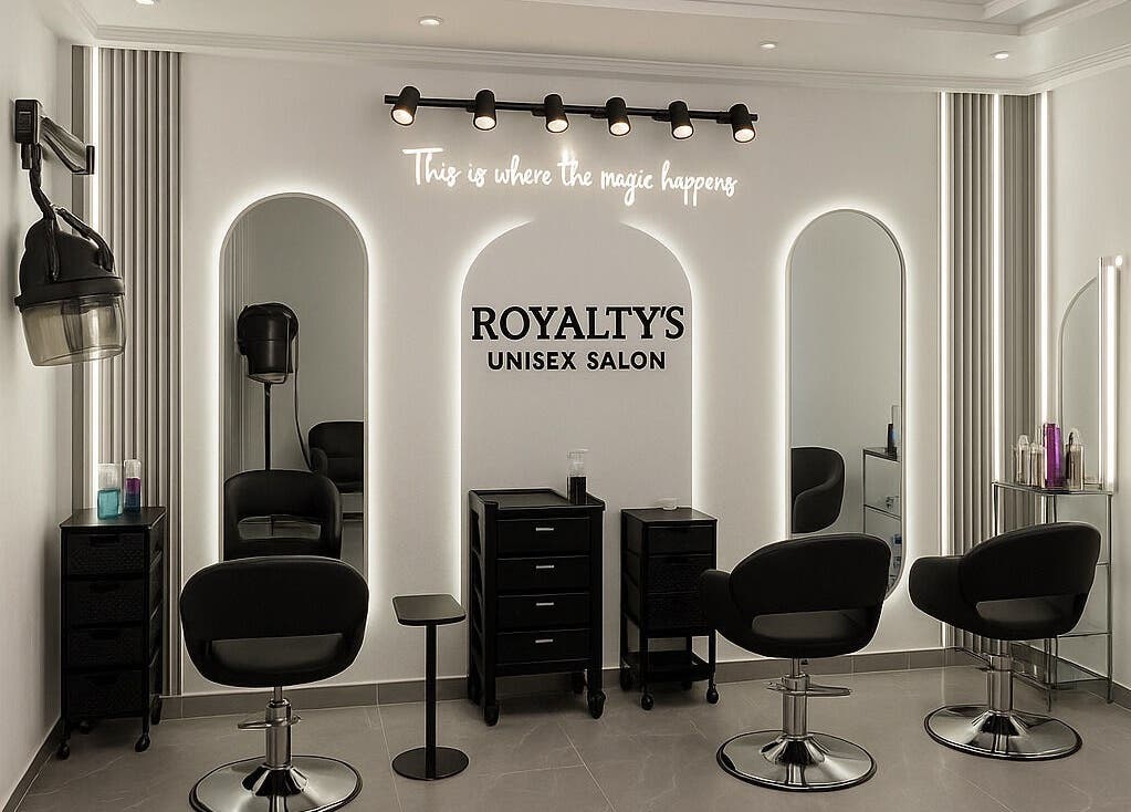 Elegant interior of Royalty’s Salon in Lagos, Lagos, NG with stylish mirrors and sleek salon chairs.