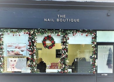 The Nail Boutique adorned in festive decor, Hersham, England, GB, offers luxurious nail services.