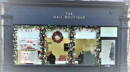 The Nail Boutique adorned in festive decor, Hersham, England, GB, offers luxurious nail services.