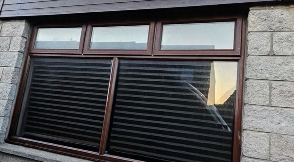 Exterior window view of Signature barber studio in Fraserburgh, Scotland, GB.