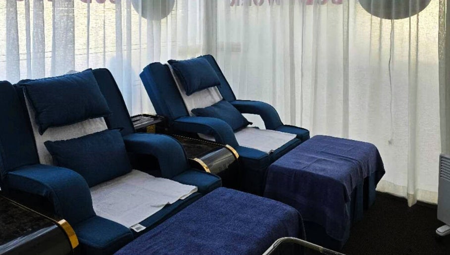 Relaxing lounge at AiRelax® Spa featuring plush seating, Auckland, Auckland, NZ.