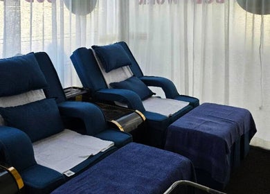 Relaxing lounge at AiRelax® Spa featuring plush seating, Auckland, Auckland, NZ.