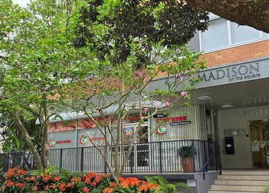 Exterior of AiRelax® Spa, nestled in lush greenery in Auckland, Auckland, NZ.