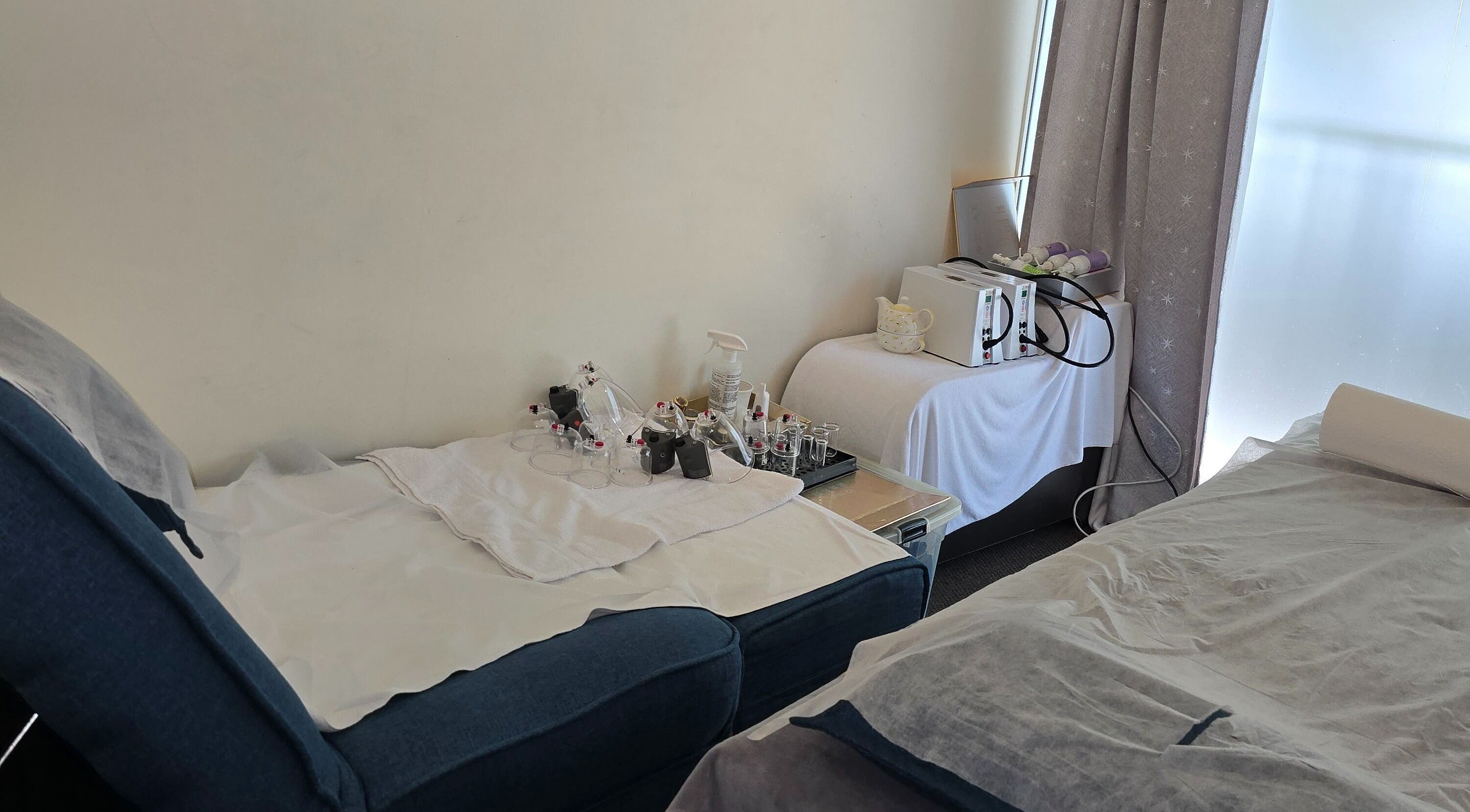 AiRelax® Bodywork therapy room with equipment in Auckland, Auckland, NZ, showcasing a serene spa setup.