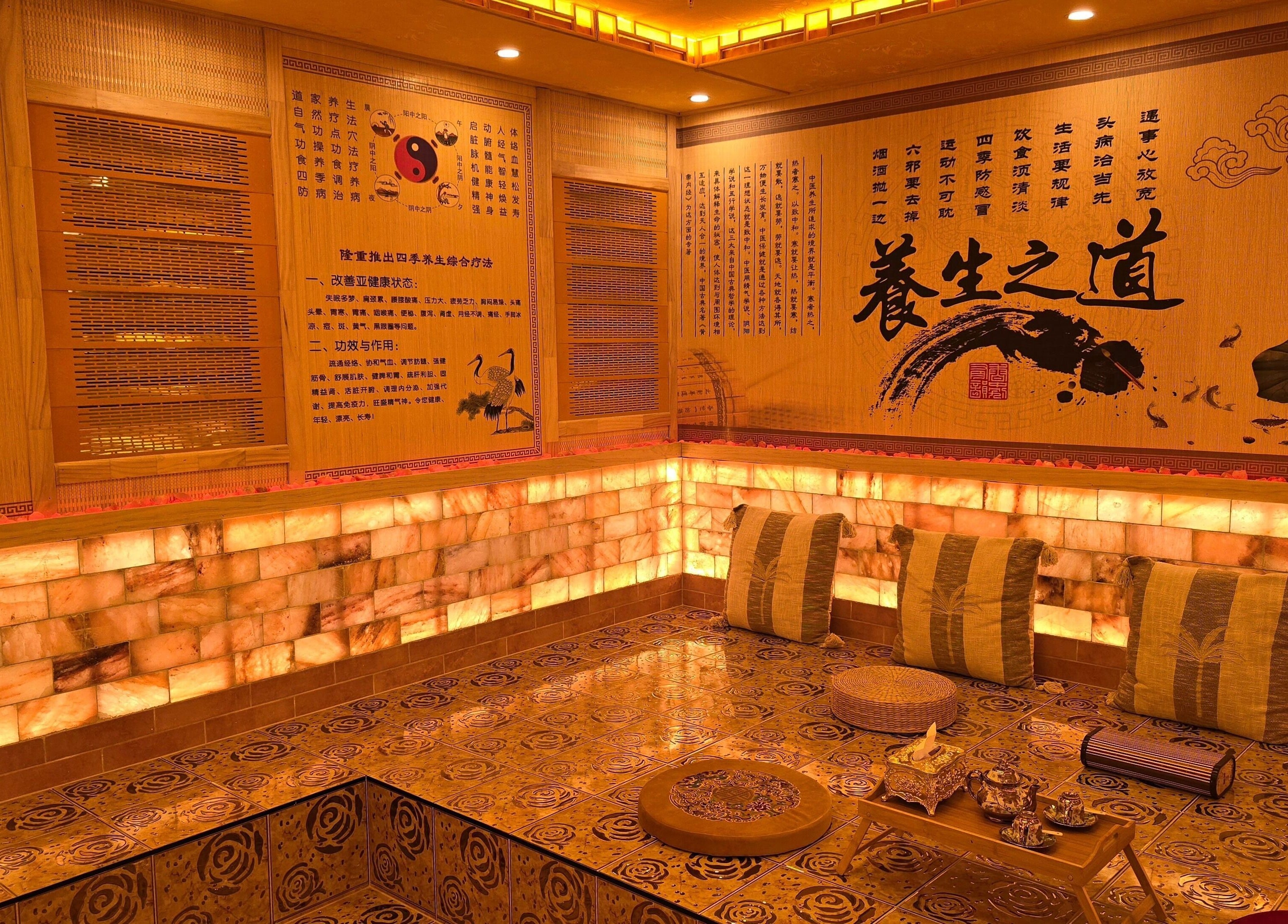 Tranquil wellness room at AiRelax® Bodywork, Auckland, NZ, featuring warm tones and soothing decor.