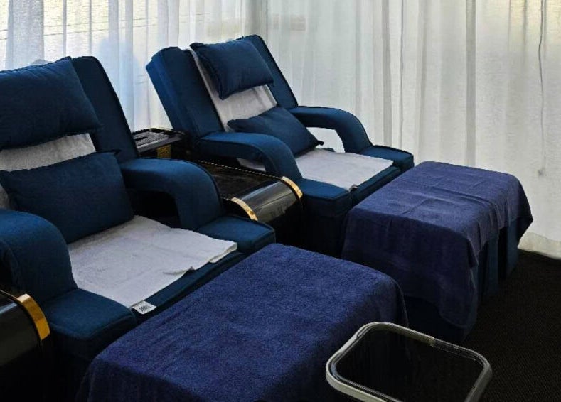Luxurious massage chairs at AiRelax® Bodywork, Auckland, Auckland, NZ, offering a serene ambiance.