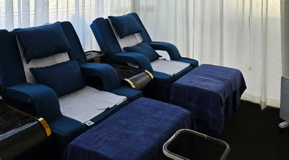 Luxurious massage chairs at AiRelax® Bodywork, Auckland, Auckland, NZ, offering a serene ambiance.