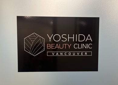 Sign of YOSHIDA BEAUTY CLINIC located in Vancouver, British Columbia, CA, showcasing elegant design.