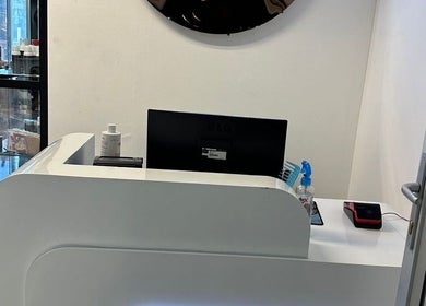 Remorehair reception area with modern decor in Sandton, Gauteng, ZA.
