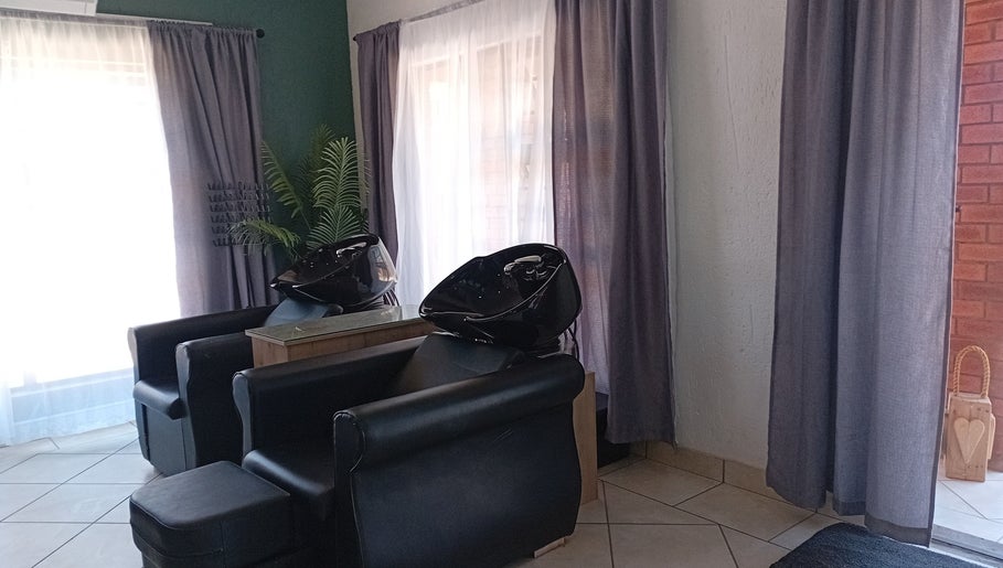 Luxurious salon chairs at Mirrors and Scissors Hair Studio, Kimberley, Northern Cape, ZA appealing for relaxation.