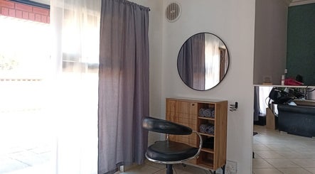 Modern hair styling station at Mirrors and Scissors Hair Studio in Kimberley, Northern Cape, ZA.