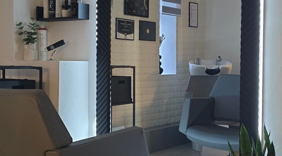 Stylish seating and decor at Vega Complete Hair Care in Durham, England, GB, enhancing wellness and relaxation.