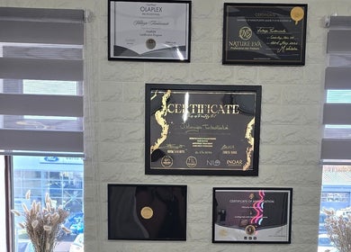 Certificates on display at Vega Complete Hair Care in Durham, England, GB showcasing professional achievements.