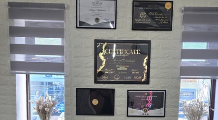 Certificates on display at Vega Complete Hair Care in Durham, England, GB showcasing professional achievements.