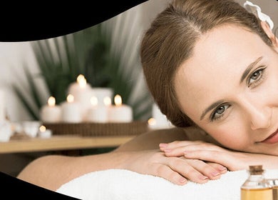 Relaxing spa experience at Thembi the light house of beauty, Cape Town, Western Cape, ZA, surrounded by candles.