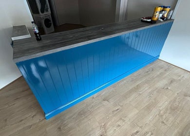 Reception area at Shampooched, featuring a blue counter in Croydon, England, GB.