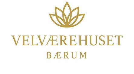 Logoen til VELVÆREHUSET BÆRUM BEDNAREK, Haslum, Akershus, NO, med stilisert lotusblomst.