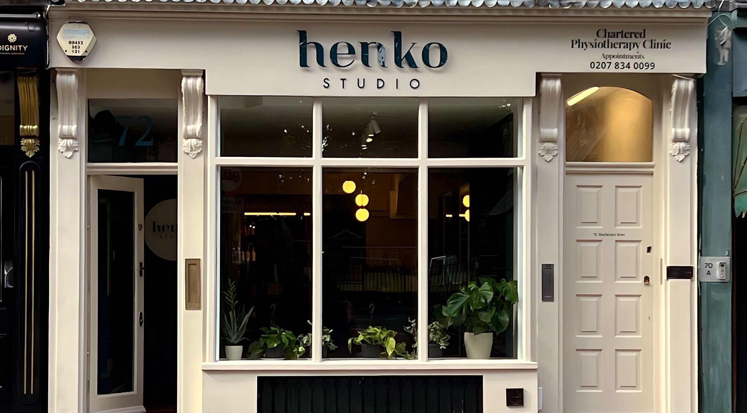Exterior view of Henko Studio in London, England, GB, showcasing a stylish facade with lush plants.
