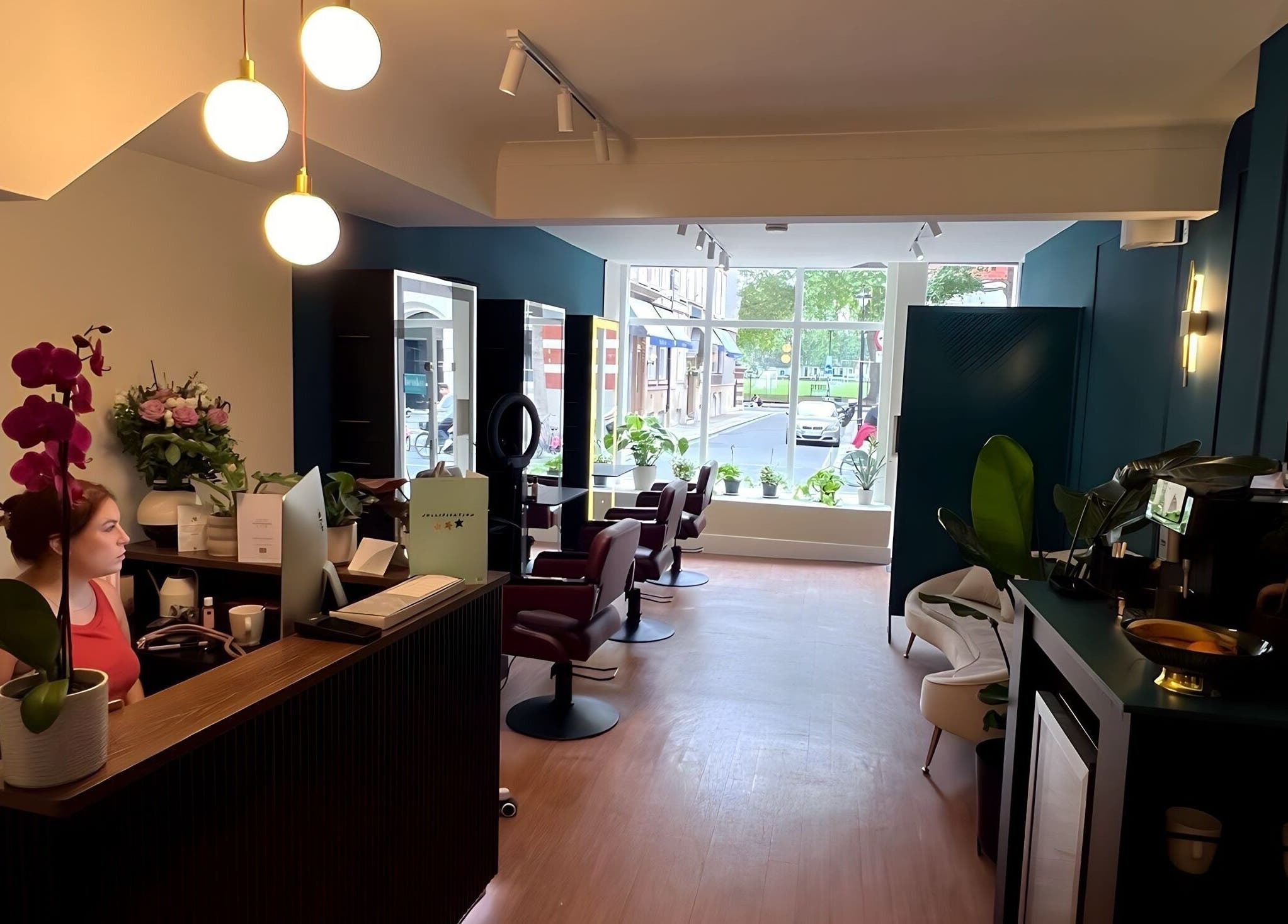 Reception and salon area at Henko Studio, London, England, GB featuring sleek decor and modern design.