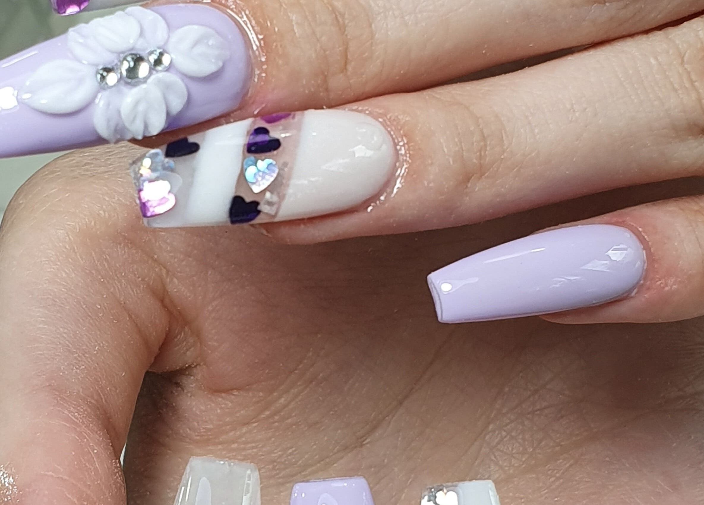 Elegant lavender nail design with 3D flowers at Sandy Nails And Headspa Therapy, Cabramatta, New South Wales, AU.