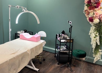 Spa treatment area at Le Fleur Beauty Lounge, Cork, County Cork, IE with elegant decor and floral accents.