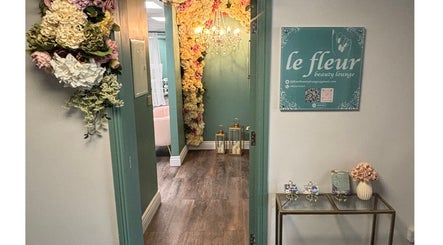 Chic floral entrance of Le Fleur Beauty Lounge in Cork, County Cork, IE, showcasing elegant decor and signage.