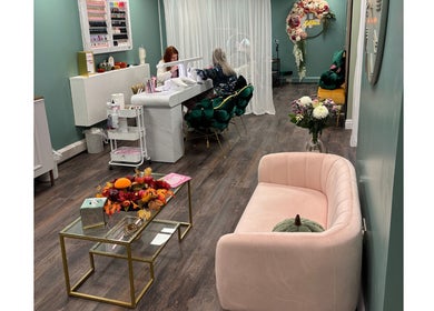 Inviting lounge at Le Fleur Beauty Lounge, Cork, County Cork, IE, showcasing a manicure station and plush seating.