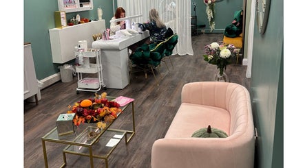 Inviting lounge at Le Fleur Beauty Lounge, Cork, County Cork, IE, showcasing a manicure station and plush seating.
