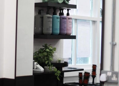 Shelf with beauty products at Glow Up Tanning & Beauty Downham, Downham Market, England, GB.