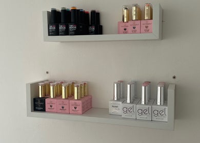 Nail polish bottles on display shelves at KvNails, Portsmouth, England, GB.