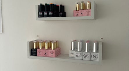 Nail polish bottles on display shelves at KvNails, Portsmouth, England, GB.