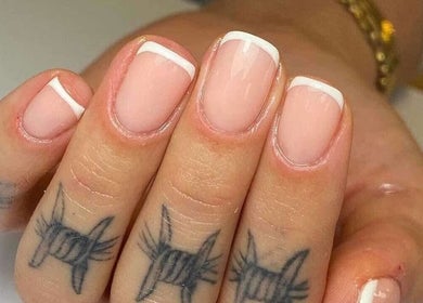French manicure at Blush Beauty And Nails in Bathgate, Scotland, GB, showcasing delicate nail art.
