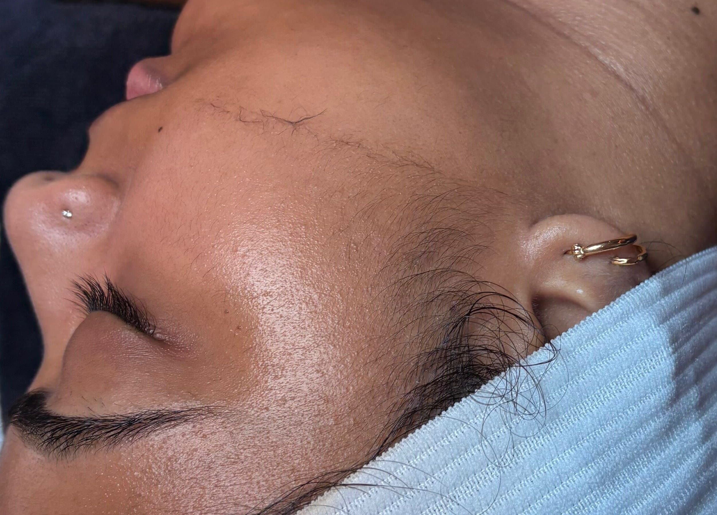 Relaxed facial treatment at Bare Beauty Co., Zephyrhills, Florida, US, showcasing a soothing spa experience.