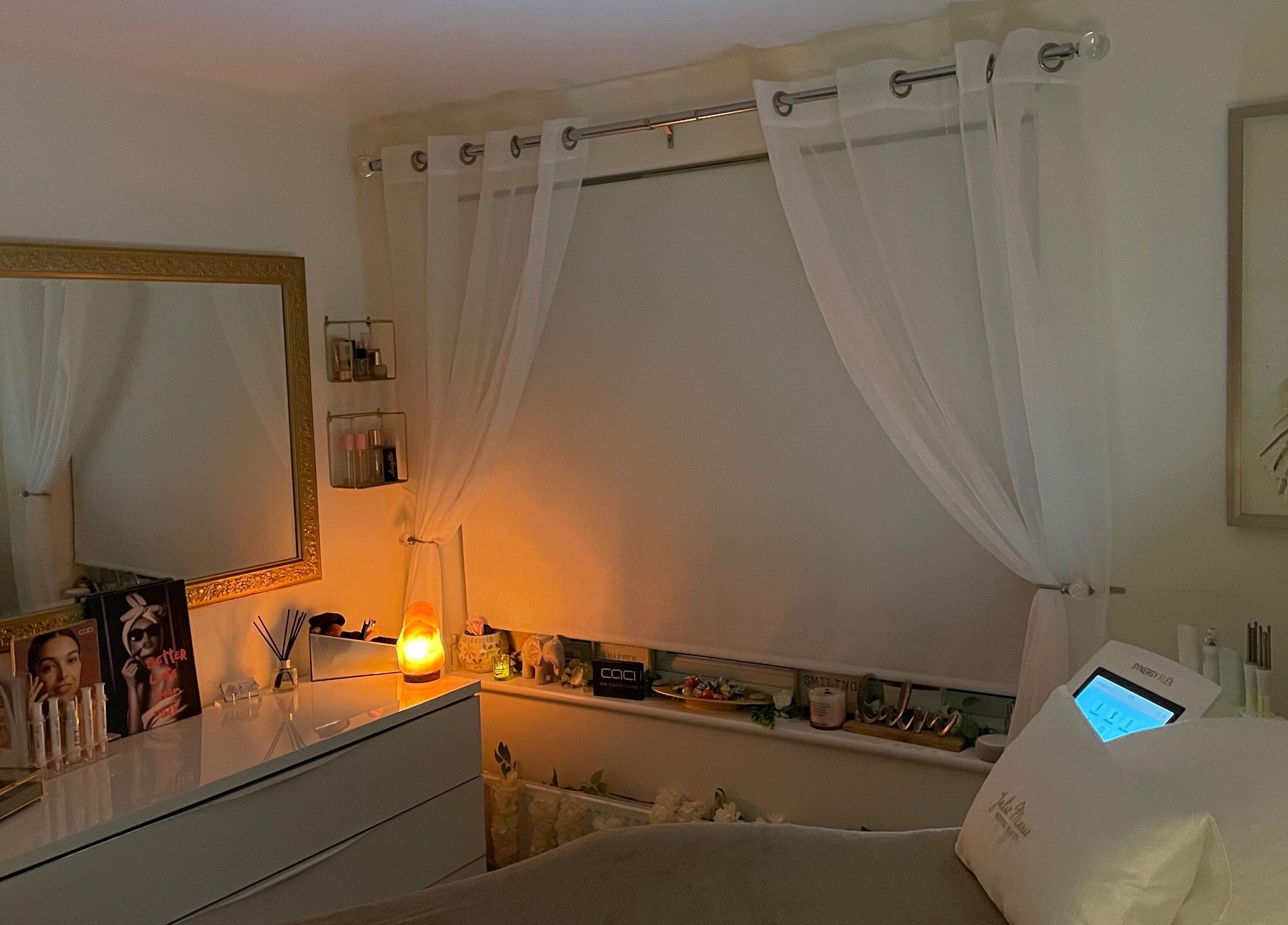 Elegant beauty room at Julie Marie Bespoke Beauty, Dunbar, Scotland, GB with ambient lighting and decor.