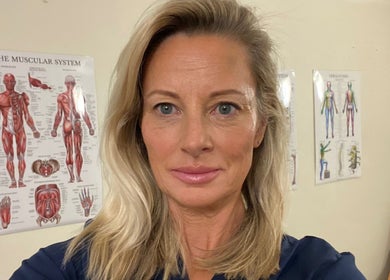 Professional at PHYZIFIT @ The Exercise Lounge, Howberry Park, Wallingford, England, GB with anatomical posters.