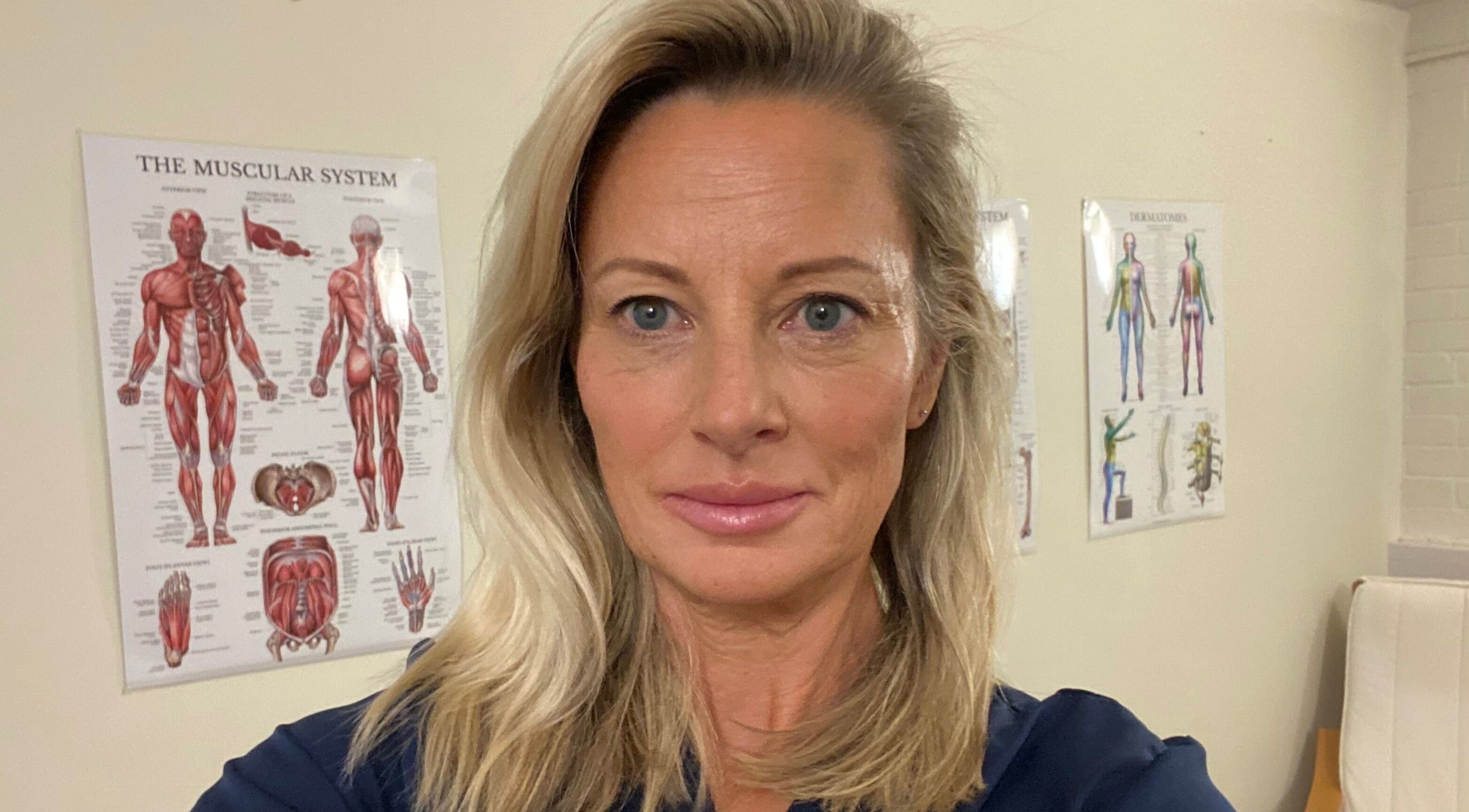 Professional at PHYZIFIT @ The Exercise Lounge, Howberry Park, Wallingford, England, GB with anatomical posters.