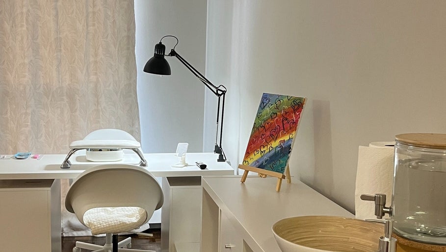 Cozy nail station at NailedbyNehita in Toronto, Ontario, CA, featuring bright decor and modern equipment.
